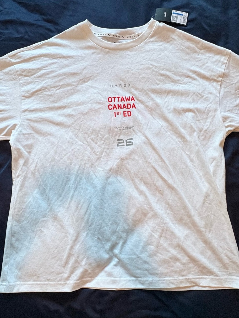 Hyrox Ottawa Puma White Short Sleeve Tee with Red Chest Graphic